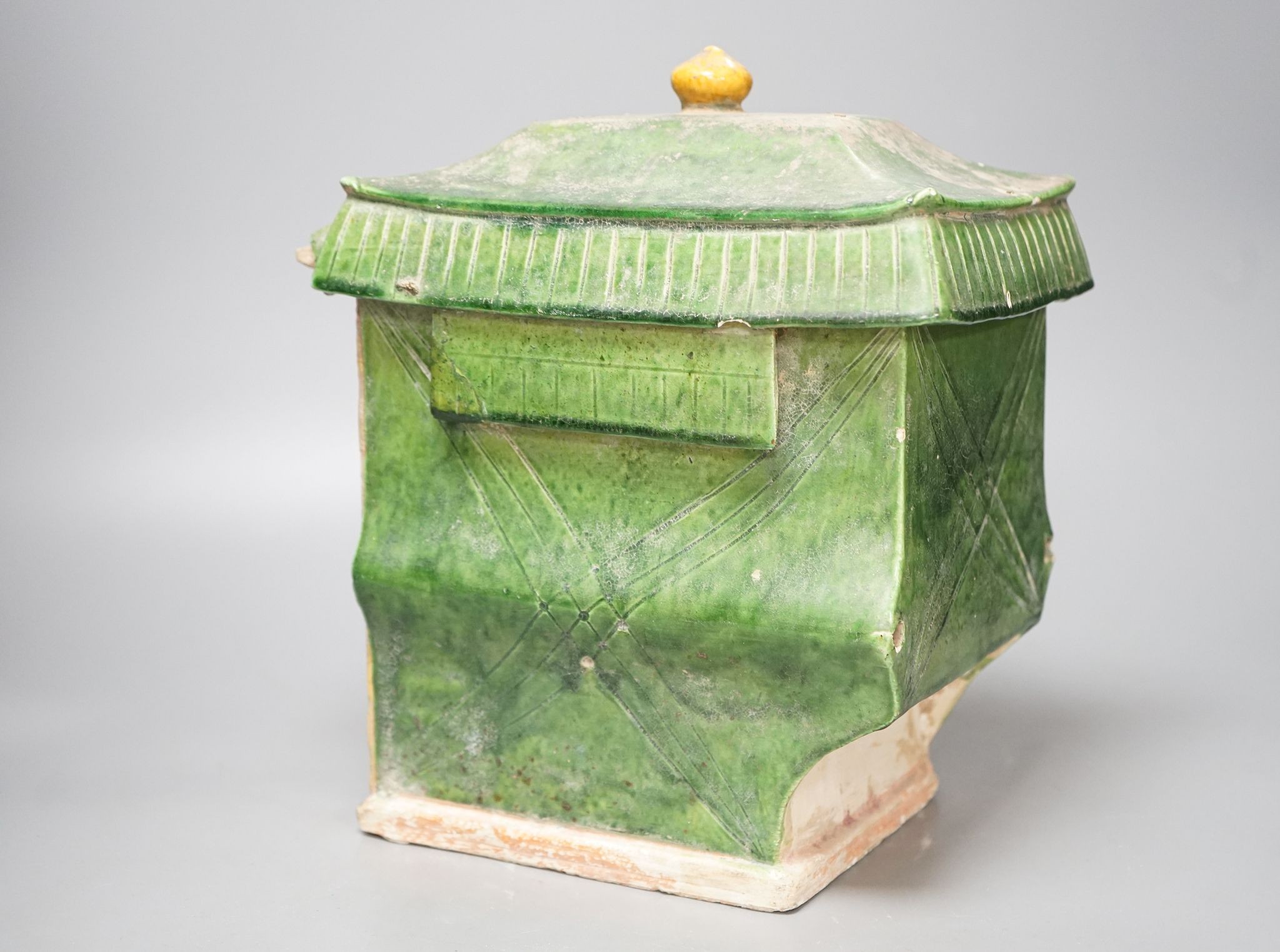 A Chinese Ming sancai-glazed model of a sedan chair with the figure Wenmu seated inside, 29cm